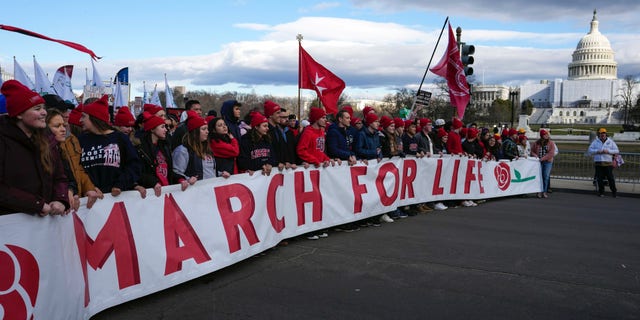 With the U.S. Capitol in the background, pro-life demonstrators march toward the U.S. Supreme Court during the March for Life, Friday, Jan. 20, 2023, in Washington. 