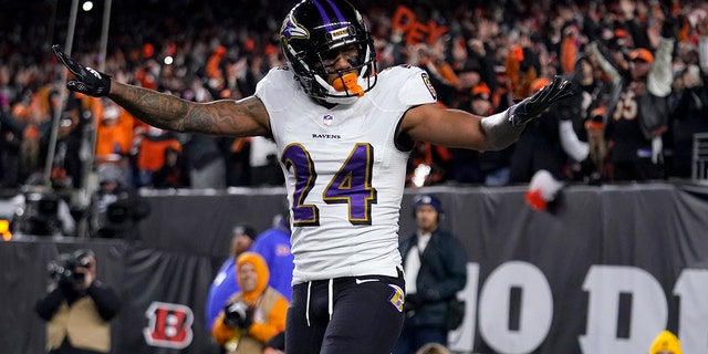 Baltimore Ravens cornerback Marcus Peters reacts to breaking up a pass intended for Cincinnati Bengals wide receiver Tee Higgins in the end zone during the first half of an NFL playoff game in Cincinnati, Sunday, Jan. 15, 2023.