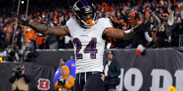 Baltimore Ravens cornerback Marcus Peters reacts to breaking up a pass intended for Cincinnati Bengals wide receiver Tee Higgins in the end zone during the first half of an NFL playoff game in Cincinnati, Sunday, Jan. 15, 2023.