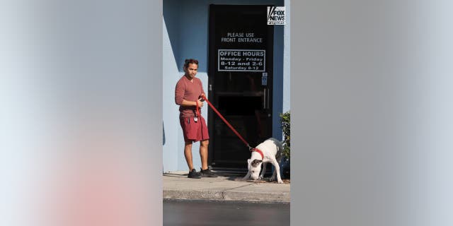 Mario Fernandez is spotted with his dog outside a veterinarian in Orlando, Florida on Friday, January 27, 2023. Fernandez is married to Shanna Gardner-Fernandez, and is a suspect in the murder of her ex-husband, Jared Bridegan.