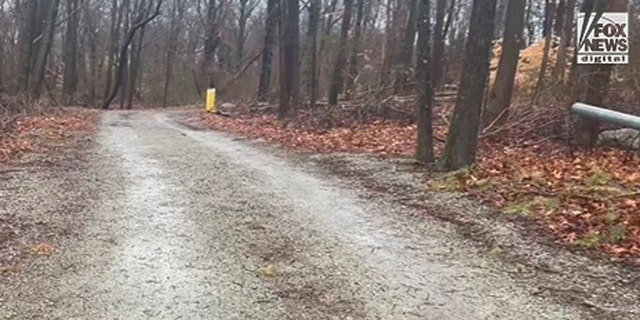 This dirt road, located behind a metal gate along Reservoir Road, leads to a cell tower in Cohasset, Mass., where Ana Walshe's cellphone pinged Jan. 2, 2023, after she disappeared. 