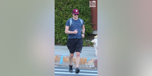 Matt Hutchins takes an energetic walk in Los Angeles on Saturday, January 21, 2023. Hutchins is the widow of Halyna Hutchins who was shot dead on the set of Rust, for which actor, Alec Baldwin has been charged with involuntary manslaughter.