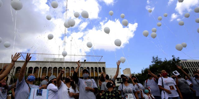 Relatives of disappeared people gather for a tribute, during the commemoration of the International Day of the Disappeared, in Guadalajara, Jalisco state, Mexico, on Aug. 30, 2020.