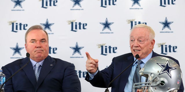 Head coach Mike McCarthy of the Dallas Cowboys and Cowboys owner Jerry Jones talk with the media during a press conference at the Ford Center at The Star Jan. 8, 2020, in Frisco, Texas.
