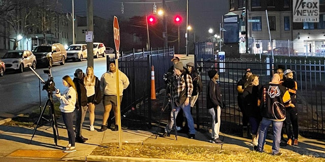 Press and fans gather outside the hospital as they await word on Buffalo Bills safety Damar Hamlin after the 24-year-old collapsed after a tackle. 