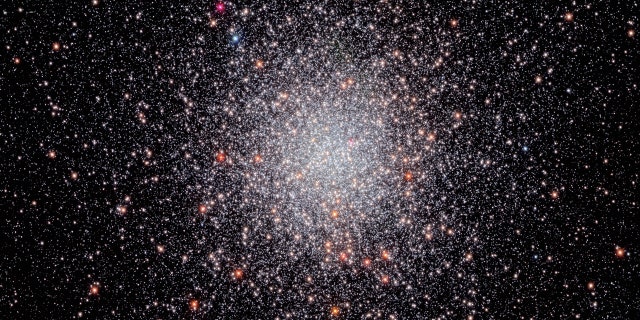 Looking like a glittering swarm of buzzing bees, the stars of globular cluster NGC 6440 shine brightly in this NASA Hubble Space Telescope image. The cluster is located some 28,000 light-years away in the constellation Sagittarius, the Archer.