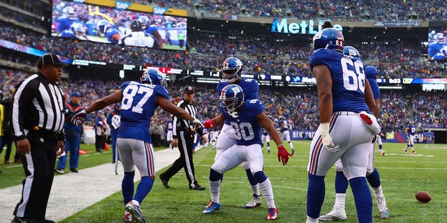 EAST RUTHERFORD, NJ - DECEMBER 18: Sterling Shepard #87 of the New York Giants celebrates his touchdown with teammates against the Detroit Lions in the first quarter at MetLife Stadium on December 18, 2016, in East Rutherford, New Jersey. 