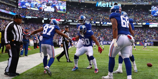 EAST RUTHERFORD, NJ - DECEMBER 18: Sterling Shepard #87 of the New York Giants celebrates his touchdown with teammates against the Detroit Lions in the first quarter at MetLife Stadium on December 18, 2016, in East Rutherford, New Jersey. 