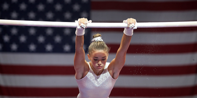 Olivia Dunne practices on the uneven bars for the U.S. Gymnastics Championships at TD Garden in Boston on Aug. 15, 2018.