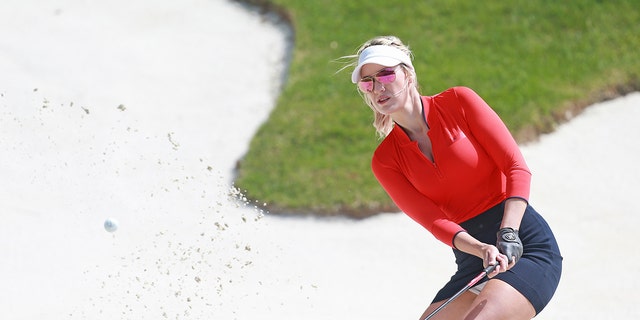 Social media personality Paige Spiranac hits from the sand during the second round of the PGA TOUR Champions Bass Pro Shops Legends of Golf at Big Cedar Lodge on April 27, 2019, in Ridgedale, Missouri.