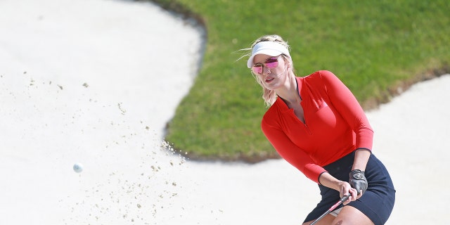 Social media personality Paige Spiranac hits from the sand during the second round of the PGA TOUR Champions Bass Pro Shops Legends of Golf at Big Cedar Lodge on April 27, 2019 in Ridgedale, Missouri.