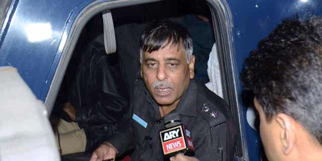 Pakistani police officer Rao Anwar responds to a reporter in Karachi, Pakistan, on Jan. 16, 2018. A Pakistani court on Jan. 23, 2023, acquitted Anwar and 17 others, mostly policemen still serving on the force, in the 2018 killing of an aspiring model.