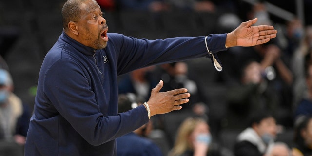 Georgetown head coach Patrick Ewing reacts during the first half of an NCAA college basketball game against Connecticut, Sunday, Feb. 27, 2022, in Washington.