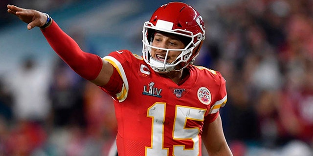Kansas City Chiefs quarterback Patrick Mahomes, #15, directs action during Super Bowl LIV against the San Francisco 49ers on Feb. 2, 2020, at Hard Rock Stadium in Miami Gardens, Florida.