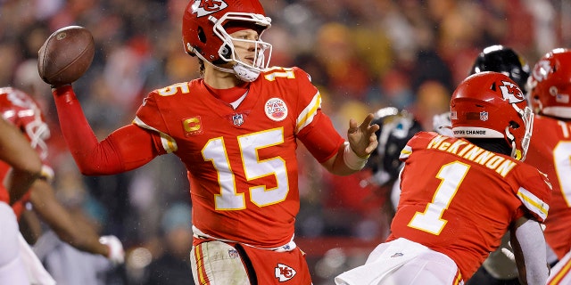 Patrick Mahomes #15 of the Kansas City Chiefs looks to pass against the Jacksonville Jaguars during the fourth quarter in the AFC Divisional Playoff game at Arrowhead Stadium on January 21, 2023, in Kansas City, Missouri.