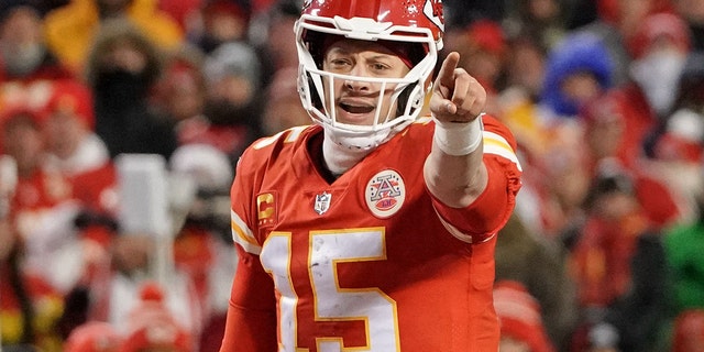 Kansas City Chiefs quarterback Patrick Mahomes, #15, gestures before the snap against the Cincinnati Bengals during the third quarter of the AFC Championship game at GEHA Field at Arrowhead Stadium Jan. 29, 2023 in Kansas City, Missouri.