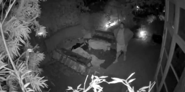 The footage shows David DePape scoping out the glass door he allegedly broke to get into the home before disappearing and coming back with two bags, pulling an object out of the smaller bag and moving it into the larger bag.