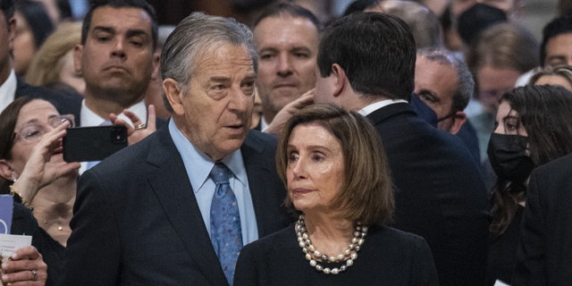Nancy Pelosi, with her husband Paul Pelosi, center, attend a Holy Mass for the Solemnity of Saints Peter and Paul lead by Pope Francis in St. Peter's Basilica, on June 29, 2022.