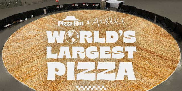 Pizza Hut and YouTube star Eric "Airrack" Decker reportedly broke Guinness World Record for the world’s largest pizza in January 2023.