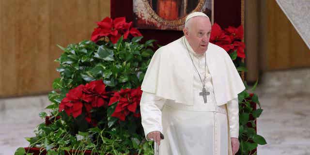 Pope Francis prays in front of the icon of the Madonna del Popolo, venerated by Belarusians and Ukrainians, during the general audience in the Paul VI Hall. Vatican City, Jan. 11, 2023.