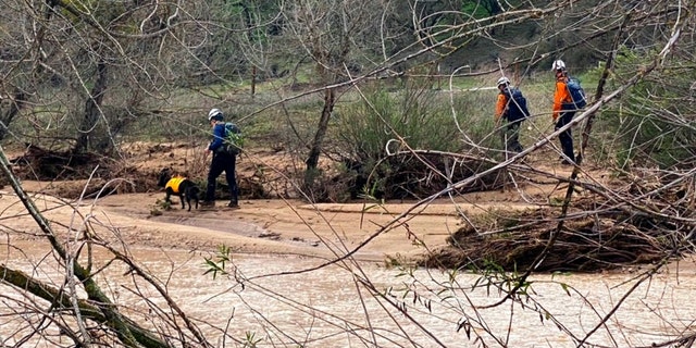 Rescuers resume their search on Wednesday, Jan. 11, 2023, for 5-year-old Kyle Doan, who was swept away Monday, Jan. 9, by floodwaters near San Miguel, California.