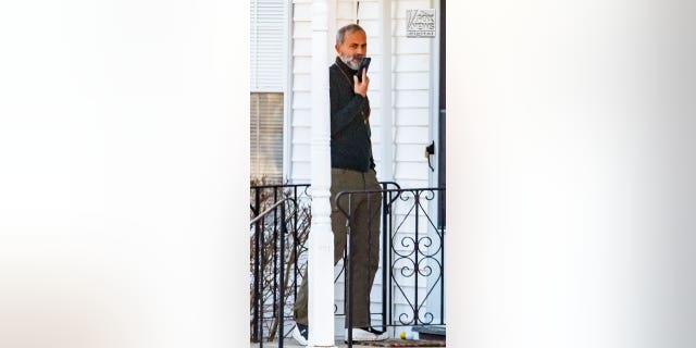Real estate consultant Gem Mutlu is seen outside his home in Nahant, Massachusetts, Monday, January 9, 2023. 