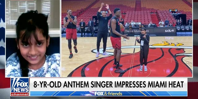 National anthem singer Pranysqa Mishra, 8 years old, drew the attention of pro basketball players as she rehearsed ahead of a game. 