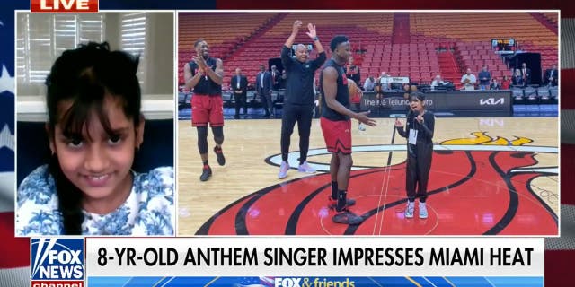 National anthem singer Pranysqa Mishra, 8 years old, drew the attention of pro basketball players as she rehearsed ahead of a game.