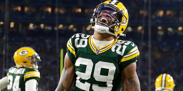Green Bay Packers cornerback Rasull Douglas, #29, celebrates a defensive stop against the Minnesota Vikings during their football game at Lambeau Field on January 1, 2023 in Green Bay, Wisconsin.