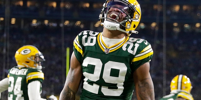 Green Bay Packers cornerback Rasull Douglas, #29, celebrates a defensive stop against the Minnesota Vikings during their football game at Lambeau Field on January 1, 2023 in Green Bay, Wisconsin.