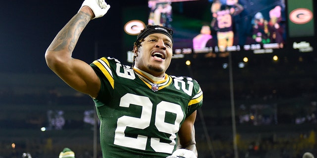 Rasool Douglas, #29 of the Green Bay Packers celebrates after a game against the Minnesota Vikings at Lambeau Field on January 1, 2023 in Green Bay, Wisconsin.