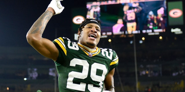 Rasool Douglas, #29 of the Green Bay Packers celebrates after a game against the Minnesota Vikings at Lambeau Field on January 1, 2023 in Green Bay, Wisconsin.