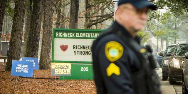 Virginia teacher emails reveal 'behavioral difficulties' with 6-year-old who shot her: report A Newport News police officer directs traffic at Richneck Elementary School in Newport News, Virginia, on Monday Jan. 30.