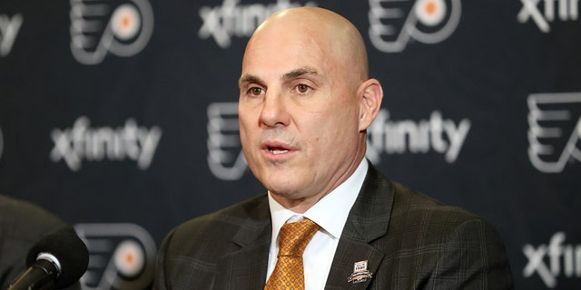 2021 Flyer Hall of Famer Rick Tocchet speaks at a news conference before the pregame ceremony at the Wells Fargo Center on November 16, 2021 in Philadelphia.