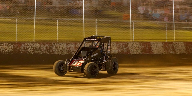 Rico Abreu, driver of the #97 Keith Kunz/Curb-Agajanian Motorsports, races around the dirt track at the Badger Midget Series race at Angell Park on July 5, 2015 in Sun Prairie, Wisconsin.