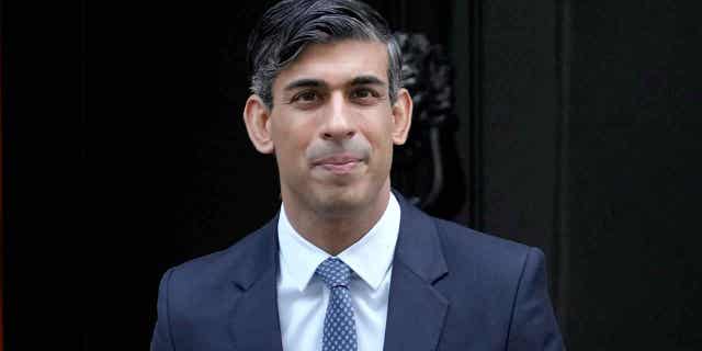 Britain's Prime Minister Rishi Sunak leaves 10 Downing Street to attend the weekly session of Prime Ministers Questions in Parliament in London, Wednesday, Jan. 11, 2023. (AP Photo/Kirsty Wigglesworth)