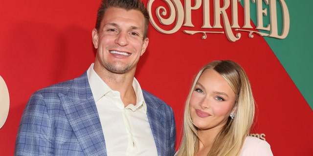 Rob Gronkowski and Camille Kostek attend Apple Original Film's "Spirited" New York Red Carpet at Alice Tully Hall, Lincoln Center, Nov. 7, 2022, in New York City. 