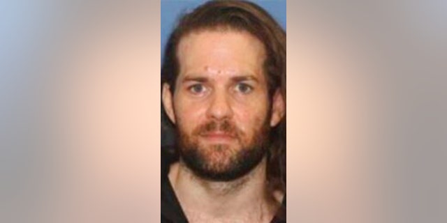 This undated photo provided by the Grants Pass Police Department shows Benjamin Obadiah Foster. Foster is accused of torturing a woman he held captive less than two years after he was convicted in Nevada of critically injuring another woman he held captive for two weeks.