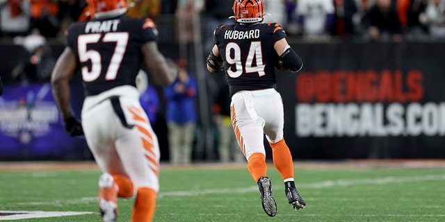 Bengals' Sam Hubbard runs 98 yards for a touchdown after recovering a fumble from Baltimore Ravens' Tyler Huntley at Paycor Stadium on January 15, 2023 in Cincinnati.