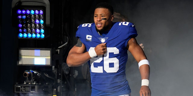 New York Giants running back Saquon Barkley is introduced before the Indianapolis Colts game, Sunday, Jan. 1, 2023, in East Rutherford, New Jersey.