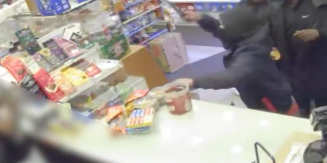 One of the suspects threw a kitchen knife at the deli's employees, according to the NYPD. 