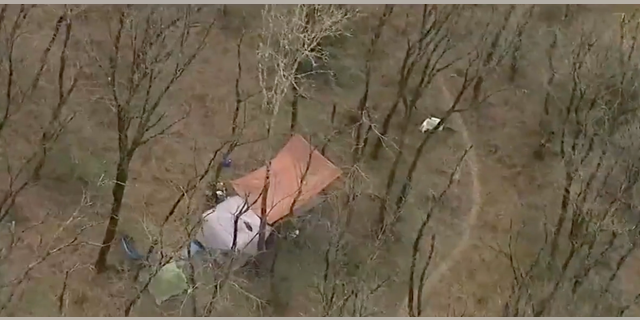 Protesters have set up tents and other accommodations in the woods. 