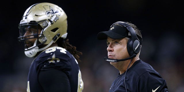 Head coach Sean Payton of the New Orleans Saints  and Cameron Jordan #94 during the NFC Wild Card playoff game against the Carolina Panthers at the Mercedes-Benz Superdome on Jan. 7, 2018 in New Orleans, Louisiana. 