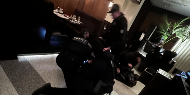 Secret Service agents with weapons drawn took down a couple who were dining at a restaurant near the White House.