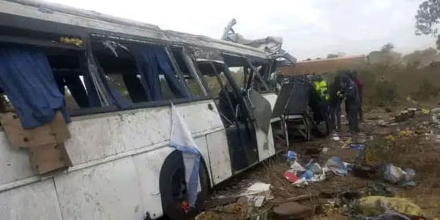 A damaged bus is pictured at the site of a collision between two buses on a road in Gniby, Senegal, Sunday Jan. 8, 2023. At least 40 people were killed and dozens injured in this bus crash in central Senegal, the country's president Macky Sall said Sunday.