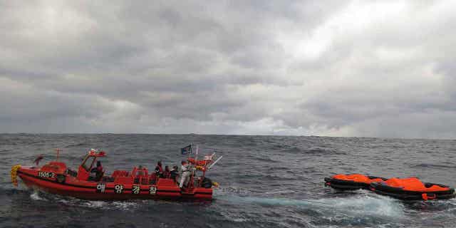 A South Korean coast guard ship conducts a search operation in the sea between South Korea and Japan on January 25, 2023. Coast guards of both countries were searching for crew members of a cargo ship sunk in the waters between South Korea and Japan.