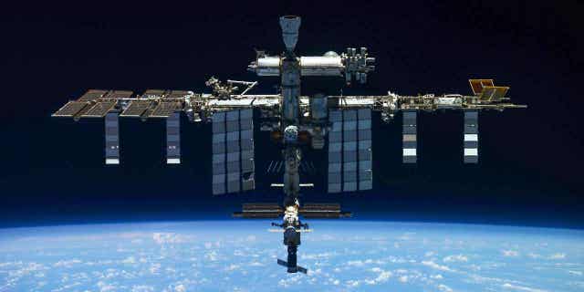 In this released photo released by Roscosmos State Space Corporation, the International Space Station is pictured March 30, 2022 by the crew of the Russian Soyuz MS-19 spacecraft after exiting the station. 