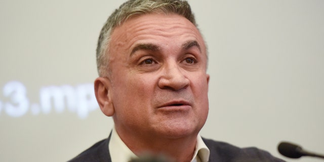 Srdjan Djokovic speaks at a news conference in Belgrade, Serbia, Jan. 10, 2022.