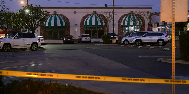 Police tape cordons off the Star Ballroom Dance Studio in Monterey Park, California, on Sunday, Jan. 22.