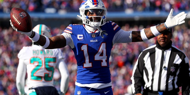 Stefon Diggs #14 of the Buffalo Bills reacts after a reception against the Miami Dolphins during the first quarter of the AFC Wild Card playoff game at Highmark Stadium on January 15, 2023 in Orchard Park, New York.